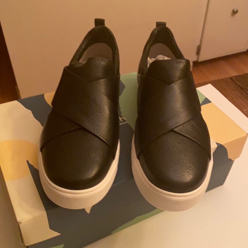 Brand new tags on leather shoes